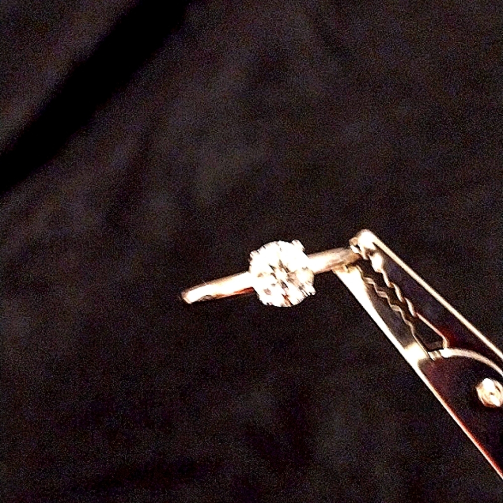 A moisenite ring and necklace. Size 7 ring. And a 20 inch chain with stone.